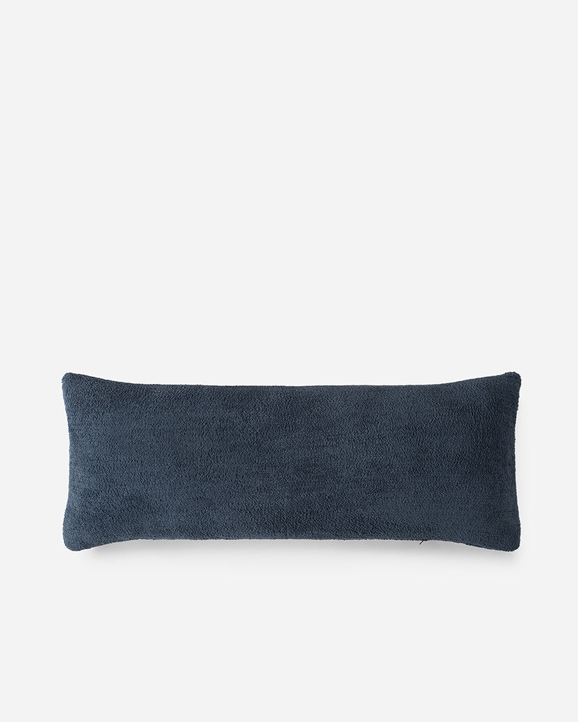 Navy blue rectangular pillow on a white background