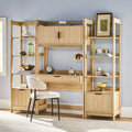 Wooden study nook with shelves, desk, and chair against a light blue wall.